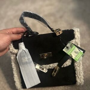 Elegant Black and Cream Handbag Badgley Mischka collection